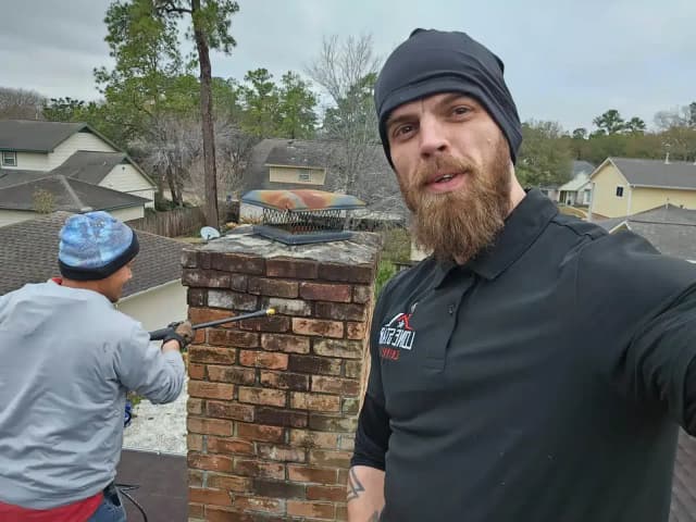 Old rusty chimney cap before replacement